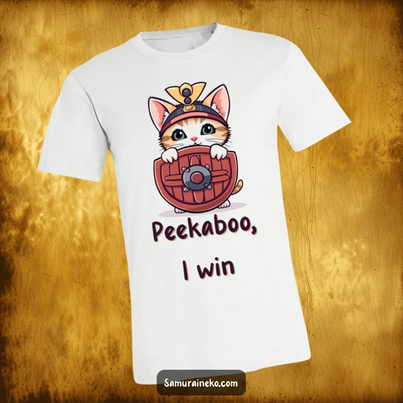 Funny t-shirt of a curious kitten peeking from behind a miniature samurai shield with a shy smile, showcasing adorable courage.